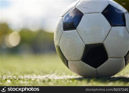 sport, soccer and game - close up of ball on football field. soccer ball on football field