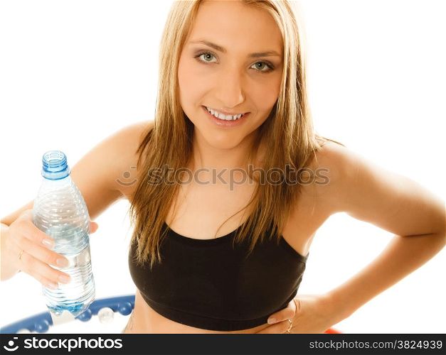Sport training gym and lifestyle concept. Sporty girl doing exercise with hula hoop. Fitness woman drinking water isolated on white