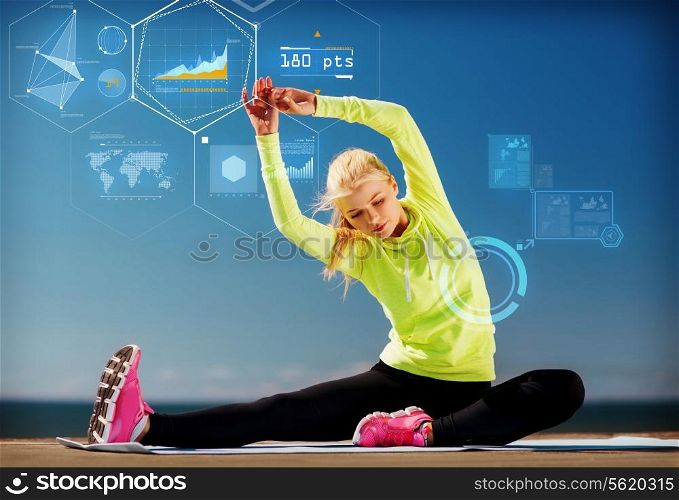 sport, training, technology and lifestyle concept - young woman exercising outdoors