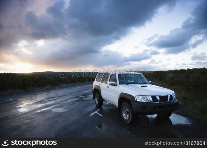 Sport utility vehicle parked on Great Ocean Road in Australia.