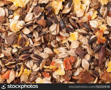 sportive muesli background with black oats. for horse.