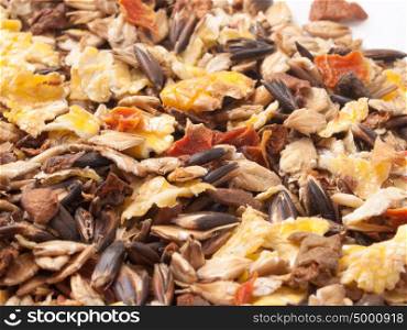 sportive muesli background with black oats. for horse. macro