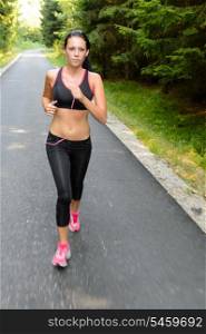 Sportive woman running outdoor training for marathon motion blur