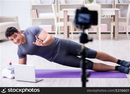 Sports and health blogger recording video in sport concept