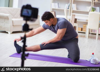 Sports and health blogger recording video in sport concept