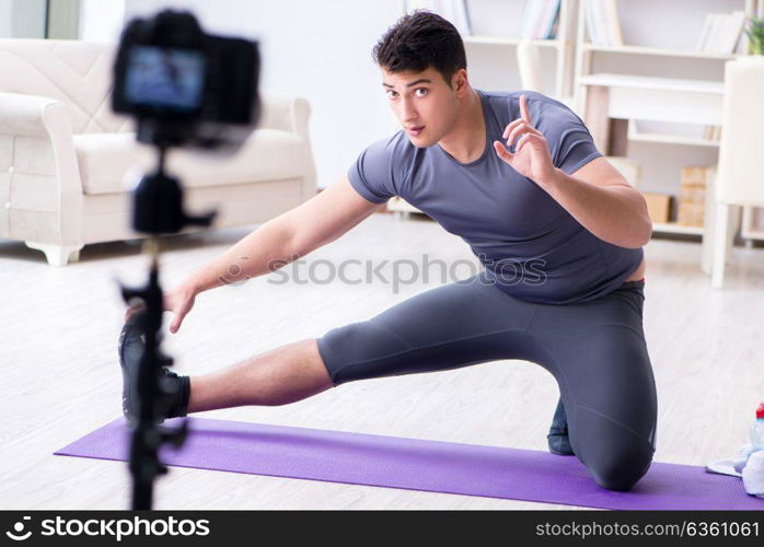 Sports and health blogger recording video in sport concept