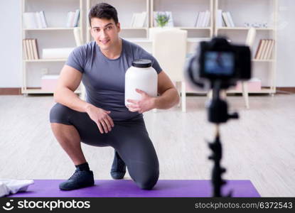 Sports and health blogger recording video in sport concept