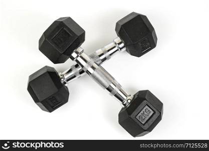 sports dumbbells with black rubber handle on white isolated background
