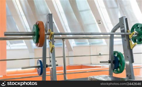 sports equipment and barbells in the gym. sports equipment in the hall