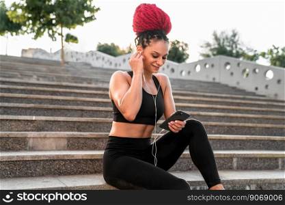 Sports female with smartphone for progress, performance and communication for a healthy lifestyle