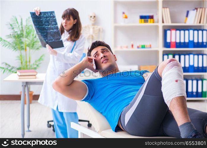 Sports player visiting doctor after injury