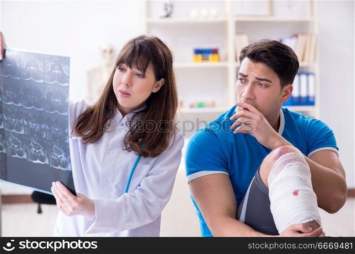 Sports player visiting doctor after injury