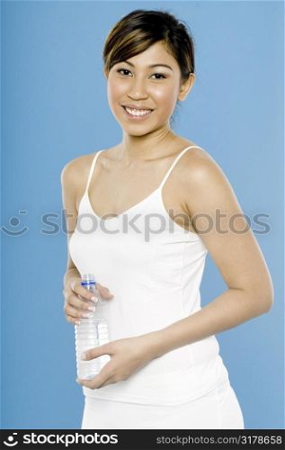 Sportswoman With Bottled Water