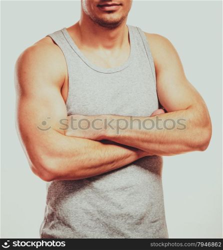 Sporty and healthy muscular man body gray background