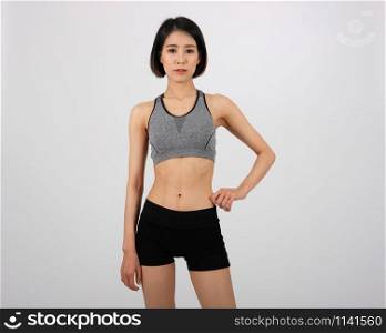 sporty fitness woman in sportswear on white background. healthy sport lifestyle