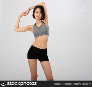 sporty fitness woman in sportswear on white background. healthy sport lifestyle