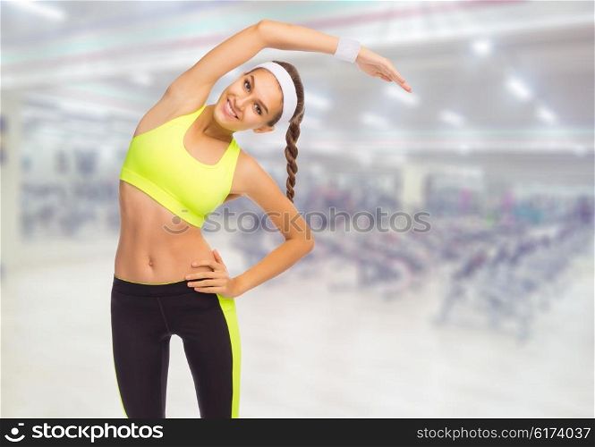 Sporty girl in fitness club
