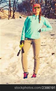 Sporty girl in winter park. Staying healthy during whole year. Fitness health nature concept. . Sporty girl in winter park