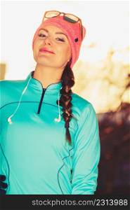 Sporty girl showing her beauty. Staying fit and war in winter. Health nature fitness fashion concept. . Sporty girl showing her beauty