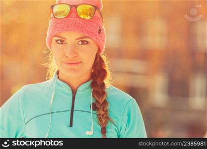 Sporty girl showing her beauty. Staying fit and war in winter. Health nature fitness fashion concept. . Sporty girl showing her beauty