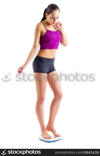 Sporty girl with scales isolated
