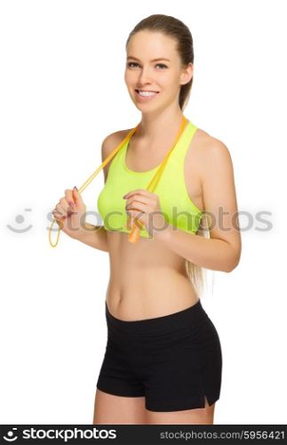 Sporty girl with skipping rope isolated