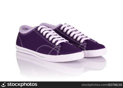 Sporty shoes in sport shoes concept on white