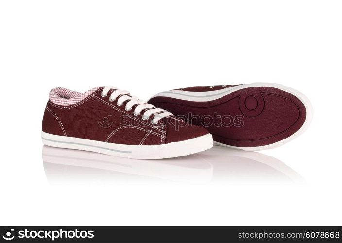 Sporty shoes in sport shoes concept on white