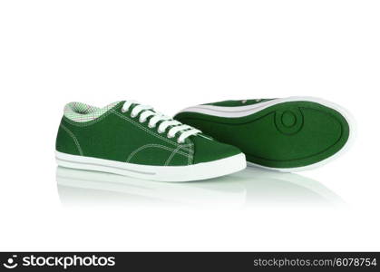 Sporty shoes in sport shoes concept on white