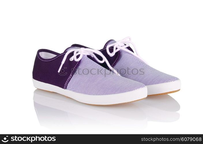 Sporty shoes in sport shoes concept on white