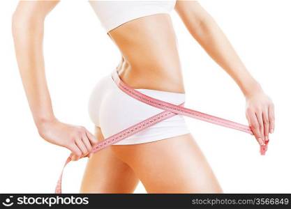 sporty woman figure with pink tapemeasure on white background