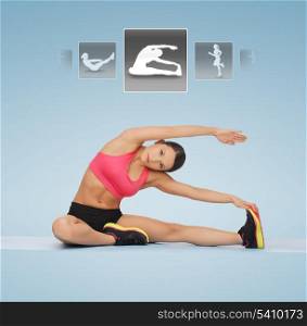 sporty woman stretching on the floor with virtual application