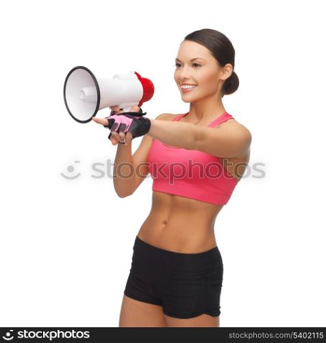 sporty woman with megaphone pointing her finger at something