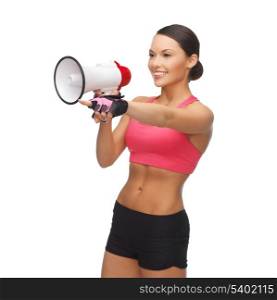 sporty woman with megaphone pointing her finger at something