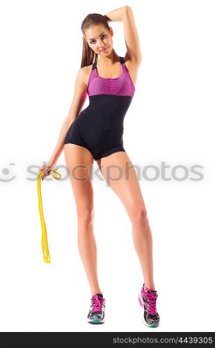 Sporty woman with skipping rope isolated