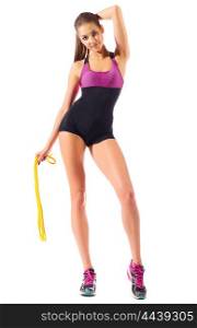 Sporty woman with skipping rope isolated