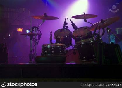 Spotlight on a drum kit in a nightclub, New Orleans, Louisiana, USA