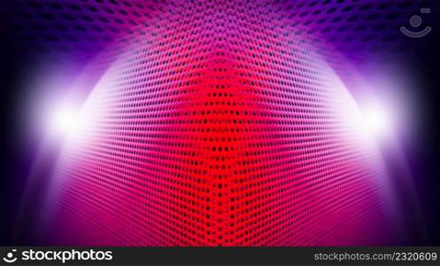 Spotlit perforated geometric modern background. Red color background. Close-up
