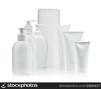 spray bottles and tubes and towel
