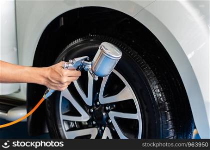 Spray the tires after washing the car to make the tires shiny and black.