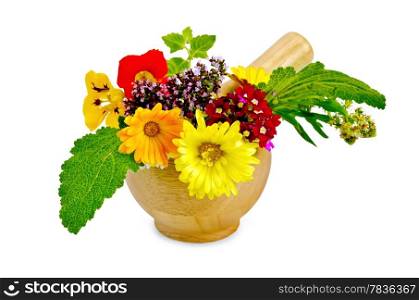Sprigs of mint, flowers of oregano, calendula, nasturtium, mignonette, verbena, sage in a wooden mortar isolated on white background