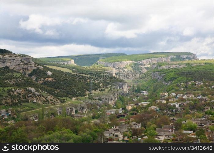 Spring cloudy view of Bakhchisaraj town (Crimea, Ukraine)