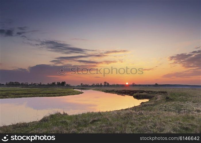 Spring countryside sunset over the river