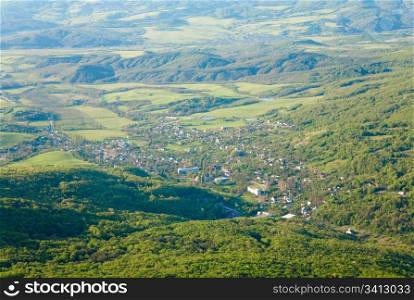 Spring Crimea Mountain country landscape with valley and Sokolinoje Village(Ukraine).