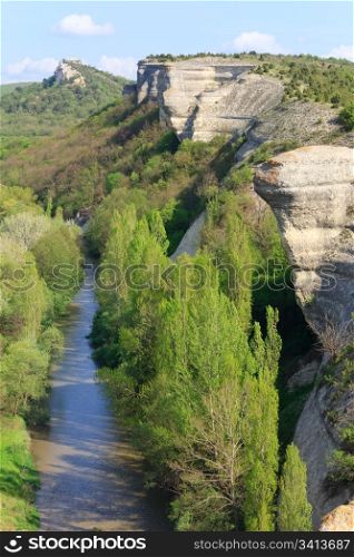 Spring Crimea Mountain landscape with precipitous rocks and river (Ukraine).