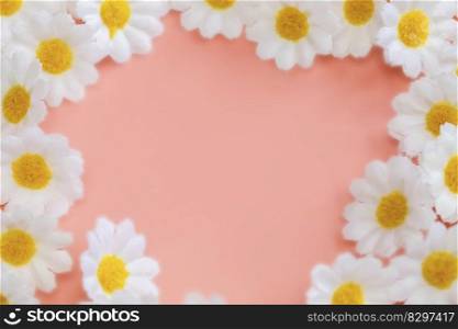 Spring Daisy frame white flowers against soft pink pastel background.Minimal styled concept. White daisy chamomile flowers on pale pink background. Creative lifestyle, summer, spring concept. Copy space, flat lay, top view. space for text. Spring Daisy frame white flowers against soft pink pastel background.Minimal styled concept. White daisy chamomile flowers on pale pink background. Creative lifestyle, summer, spring concept. Copy space, flat lay, top view.