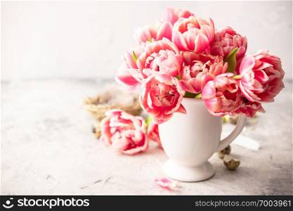 Spring flowers and Easter decorations on shabby chic background, Space for text