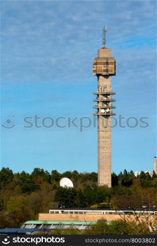 Spring Landscape with a television tower against a blue sky