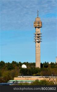 Spring Landscape with a television tower against a blue sky