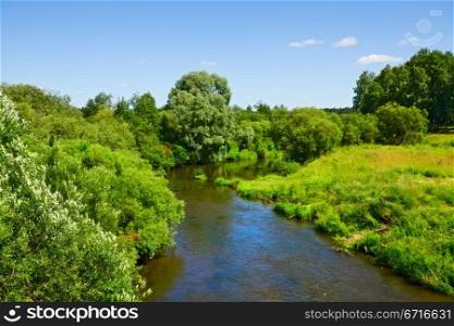 spring landscape with calm river at sunny day